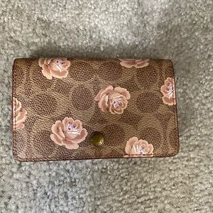 Coach floral gold over wallet
